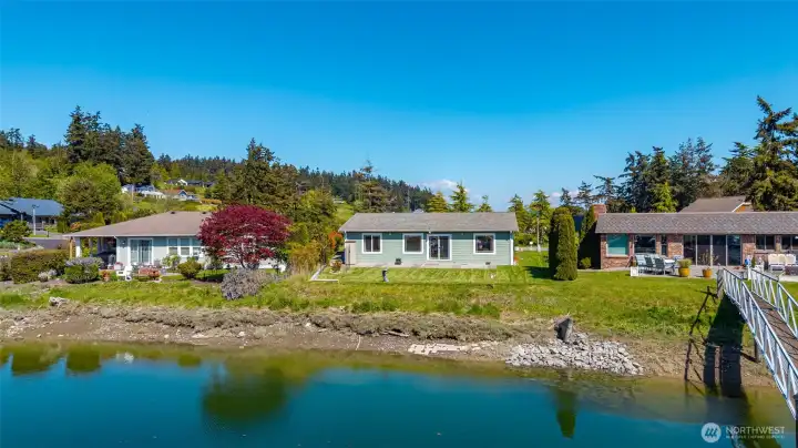 View from canal-launch your kayak from your yard. Community dock nearby.