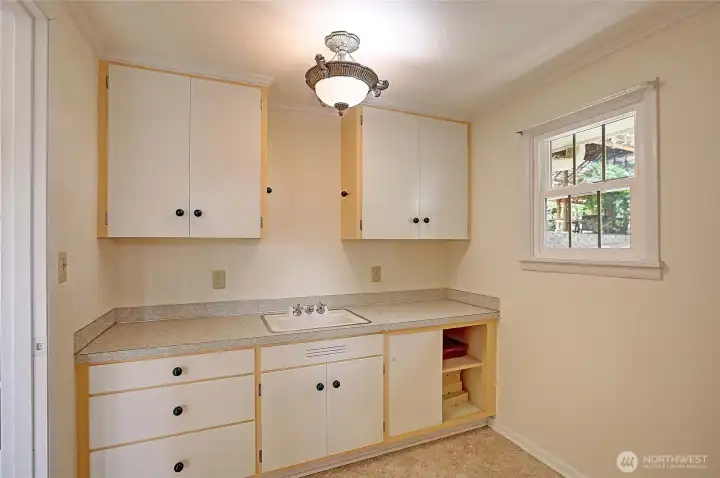 Studio apartment kitchenet area with 1/2 bath as well...