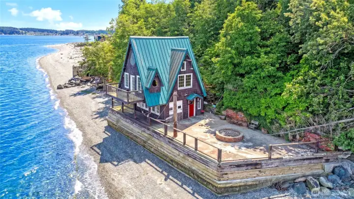 Seller tore down an old cabin and rebuilt the boat house beginning in 1997 and completed in approximately 2001. It definitely is an iconic landmark when