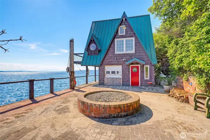 The seller created this great patio area with a large fire pit...