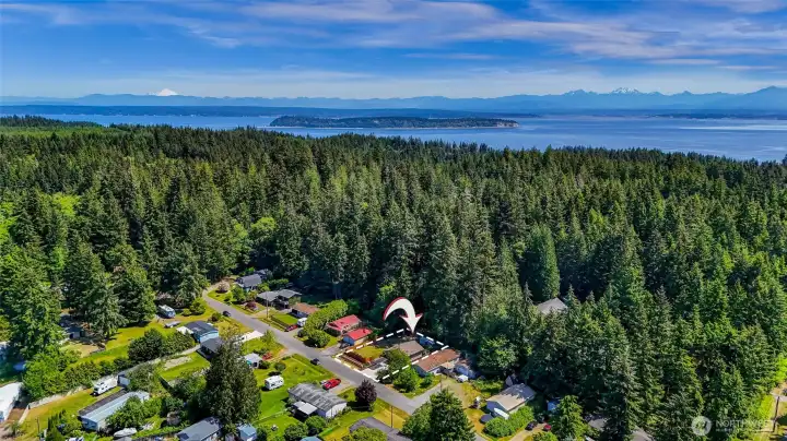 Gorgeous easterly views of Saratoga Passage, Possession Sound, the Cascade Mountains and white-capped Mt. Baker.