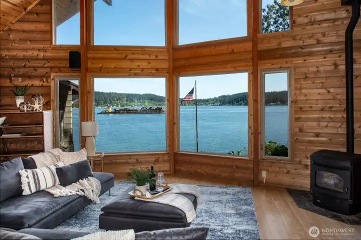 Wow, once inside Great Room, perfect for relaxing in front of your view with a cozy pellet stove for those chilly Pacific Northwest evenings.