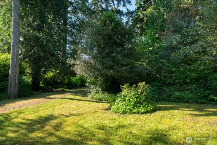 From the back of the home, driveway on left takes you back to Watauga Beach Dr E.