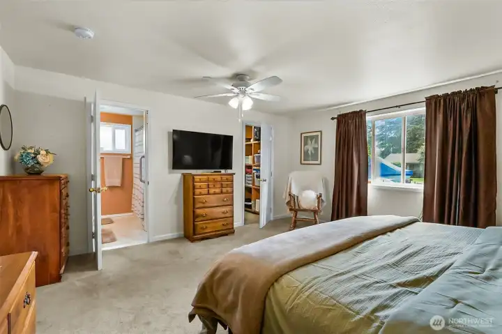 Primary Bedroom with Walk in Closet and Ensuite Bathroom Primary Bedroom with Walk in Closet and Ensuite Bathroom