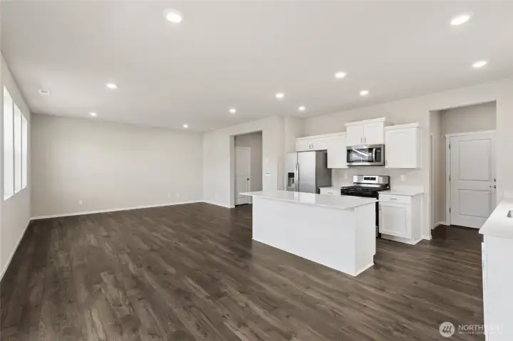 Dining space off kitchen island offer plenty of space. Refrigerator not included. Finishes and options will vary. Dining space off kitchen island offer plenty of space. Refrigerator not included. Finishes and options will vary.