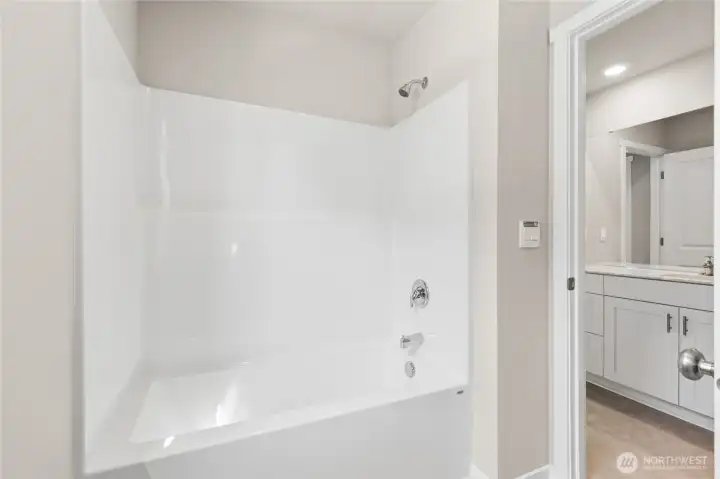 Main hall bath offers separate room for shower/bathtub and toilet. Finishes and options will vary. Main hall bath offers separate room for shower/bathtub and toilet. Finishes and options will vary.