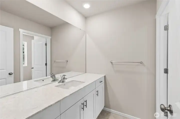 Main hall bath offers separate room for shower/bathtub and toilet. Finishes and options will vary. Main hall bath offers separate room for shower/bathtub and toilet. Finishes and options will vary.