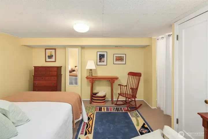 non conforming lower level bedroom just off of 3/4 bath