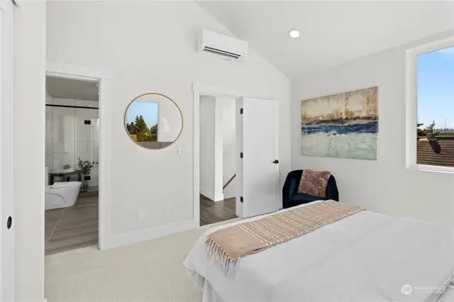 Master bedroom features an en-suite bathroom and stylish accents for a luxurious feel.