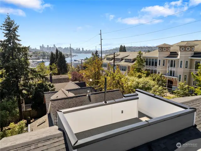 Stunning rooftop deck offering breathtaking views of the Seattle skyline and Lake Union.