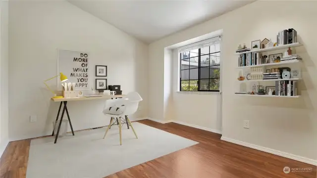 Bedroom on main level-virtually staged as an office