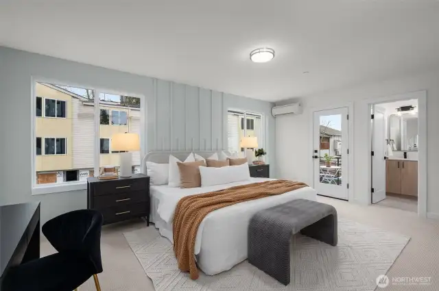 Your dreamy retreat awaits. The luxe primary suite offers serene vibes and natural light from every angle—plus a peek into your spa-like bath and private balcony!
