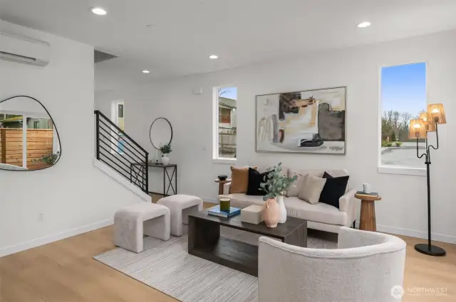 A style that speaks your language. Whether you’re hosting guests or just lounging solo, this space delivers comfort with a side of sophistication—and a staircase moment that pops.