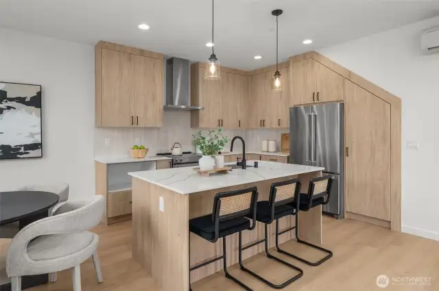 A kitchen that works and wows. Storage for days and a layout that makes weeknights feel like the weekend.