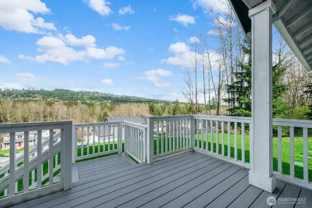 This cozy front porch is the perfect place to enjoy a morning cup of joy! (The deck is scheduled to be sanded and repainted prior to closing and with the weather allowing)