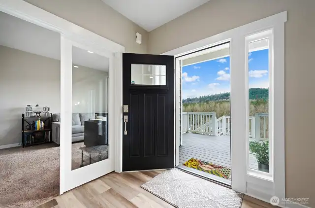 French doors open to a generously sized main floor office. This office includes a walk in closet with extra storage.