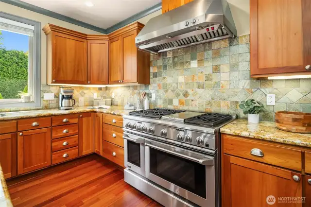The high-end appointments continue with this home's fabulous appliance package. Enjoy double ovens, warming drawers, a 6-burner cook top, the list goes on. The powerful vent/hood is a huge plus as all cooks know.