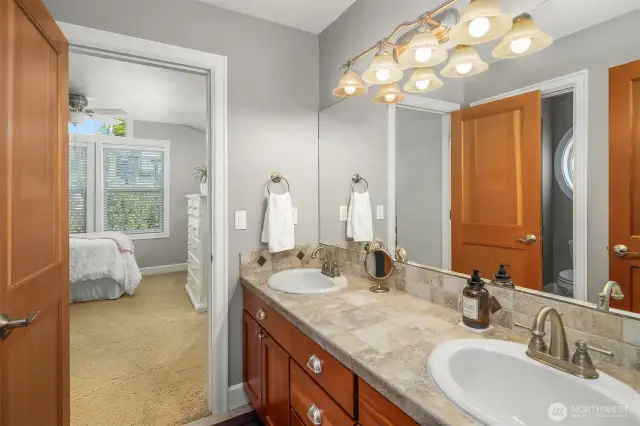 Do you love a jack and jill bathroom like most people?  Well here you go!  This sweet bathroom connects two of the upstairs bedrooms!  So convenient and even more fun!