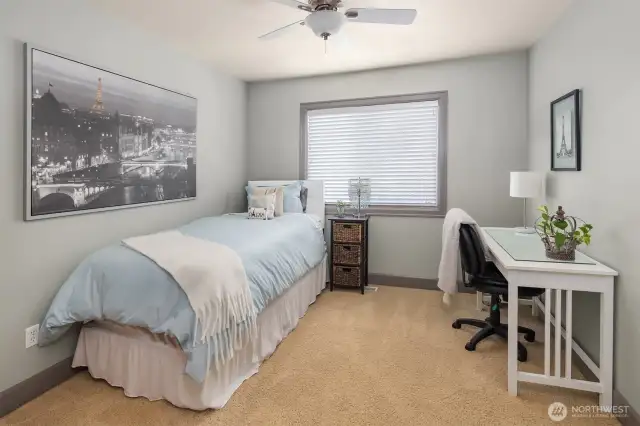 This is the bedroom on the other side of the jack and jill bathroom. This home is zoned to the award-winning Lake Washington School District.