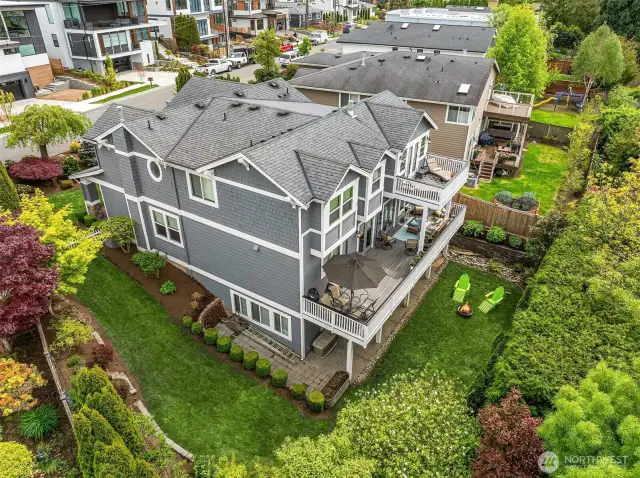 This photo gives you a great feel for both the scale of this home and its private setting.  The lot is large enough to create space between neighbors without being too much to maintain.  The back yard is the perfect amount of space to have a game of catch or to play with your dog.