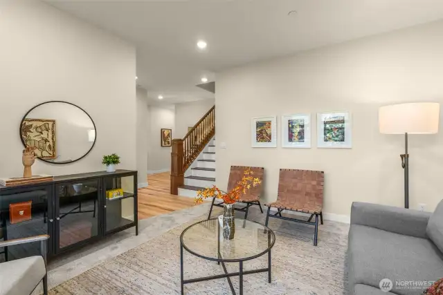Downstairs family room, perfect for cozy or formal entertaining.