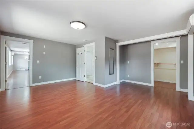 Spacious primary just off the kitchen/living area--you'll love the space in here, let alone the walk-in-closet.