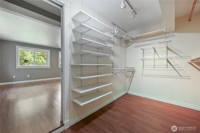 Walk-in closet only partially seen here--you'll LOVE it!  Well-lit, and lots of shelving.