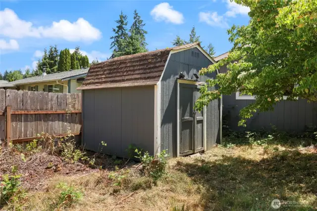 Shed out back offers additional storage, and allows the garages to be used for other purposes!