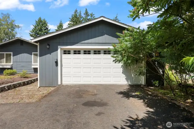 Detached garage is has matching door for a seamless addition.