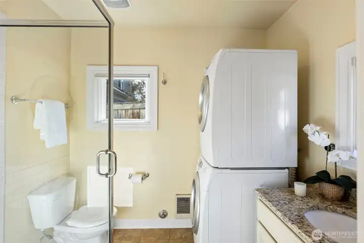 3/4 bath and laundry located just off of the kitchen.