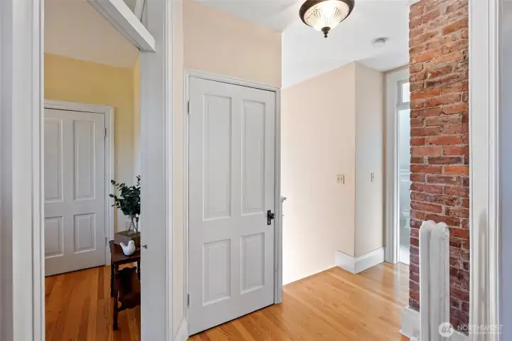 View of the hallway to additional bedrooms.