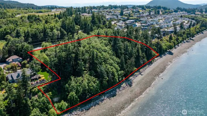 4.2 acres to build your private estate or develop into multiple lots. Rare vacant land on the North end of Fidalgo Island.