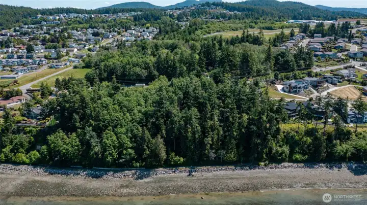 Close up shot of property showing development around the parcel.