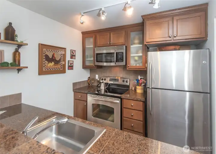 Stainless steel appliances and thoughtfully updated kitchen.