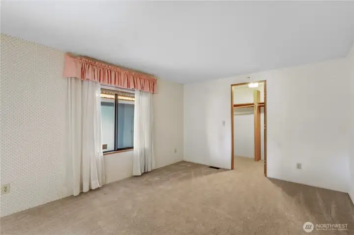 The primary bedroom includes a walk-in closet.