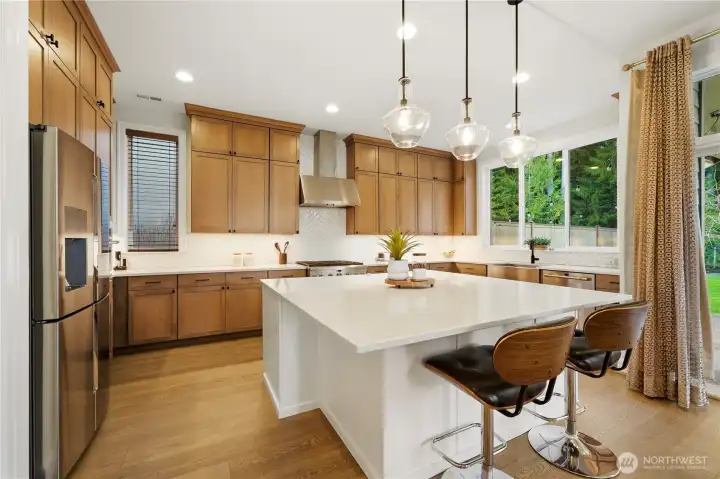 Exspansive Upgraded finishes, quartz counters, and full height cabinetry