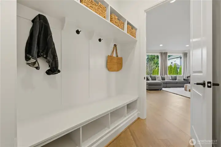 Mud room off the three-car garage. Convenient access to kitchen/great room. Perfect for coats, shoes, and bags.