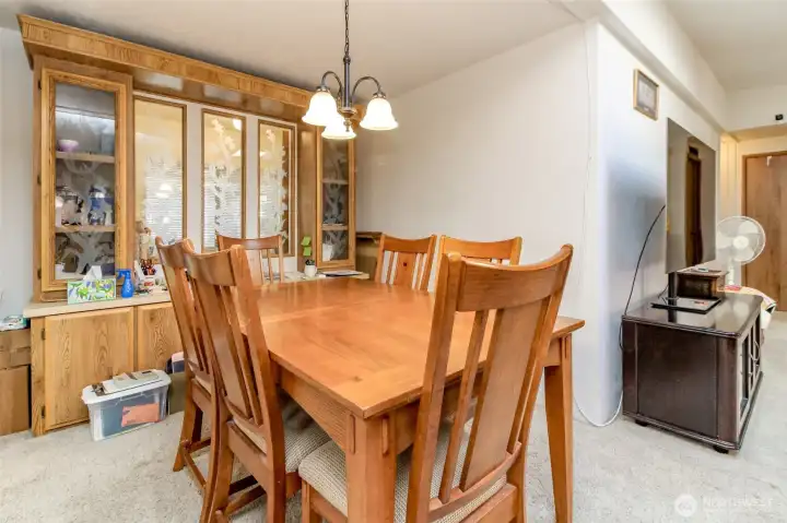 Dining Room showcasing elegant china cabinets, perfect for displaying fine porcelain and creating a warm, inviting atmosphere.