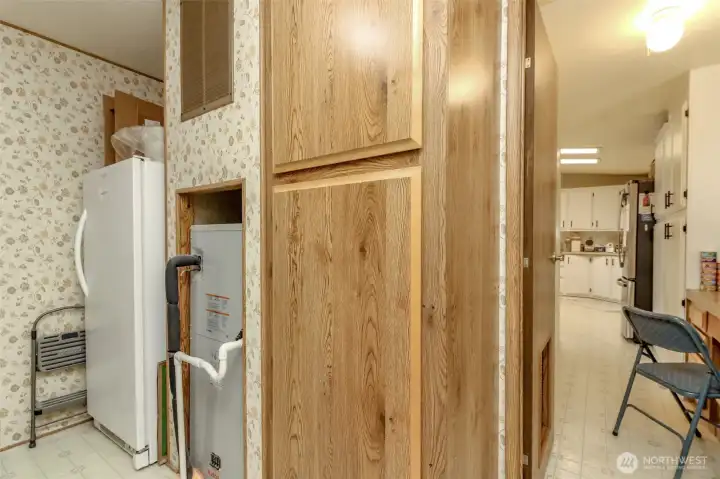 Furnace and New Hot water tank. Stand-up Freezer does not convey.