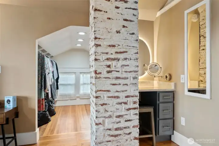 Walk in closet and built in make up vanity with jewelry cabinet w/mirror