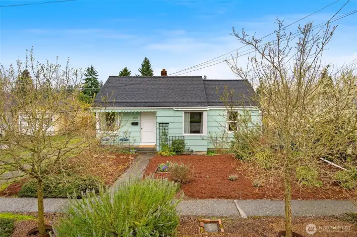 11437 Cornell Ave S is a gardener's dream with many updates including a new roof, gutters, electrical, and air conditioning!