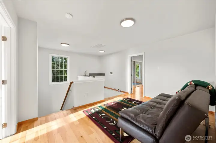 Landing Outside of Bedroom Suite #2 & Bedroom #5: Offers Lounge Area, With Laundry Room and Utility Sink.