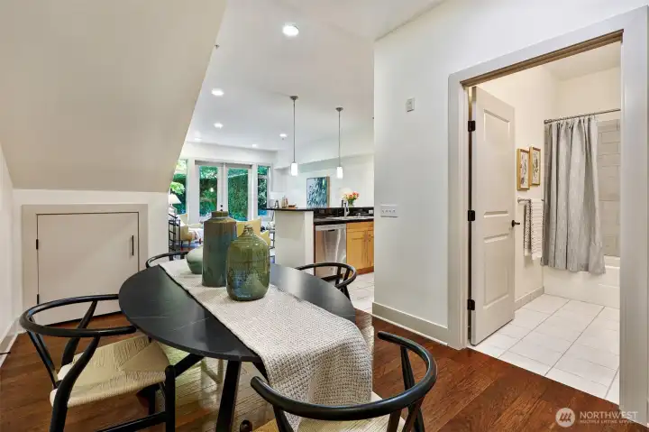 The dining room is near the unit front door.  If a dining room is not a requirement, it would make a nice foyer too.  There is a coat closet and under stair storage.  The full guest bathroom is conveniently on this main floor.