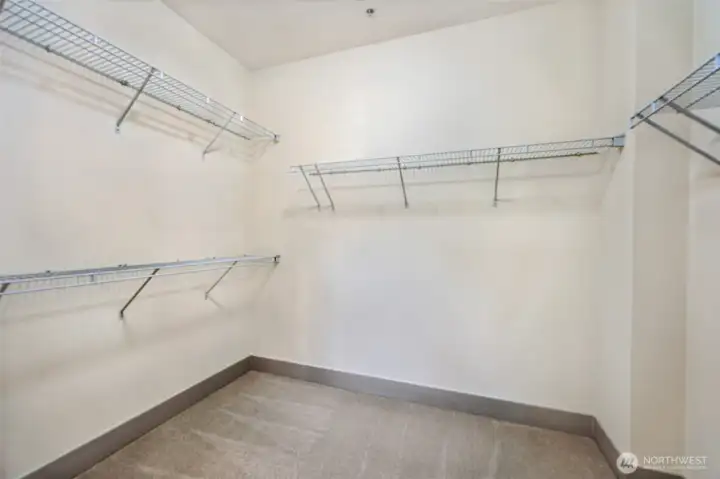 Primary walk in closet.