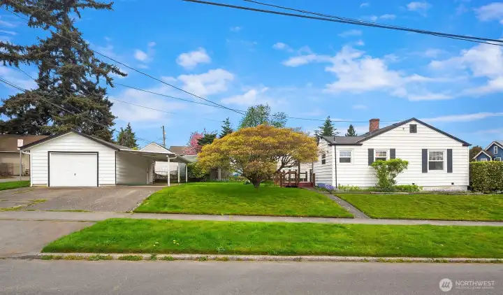 Detached garage and corner lot home.
