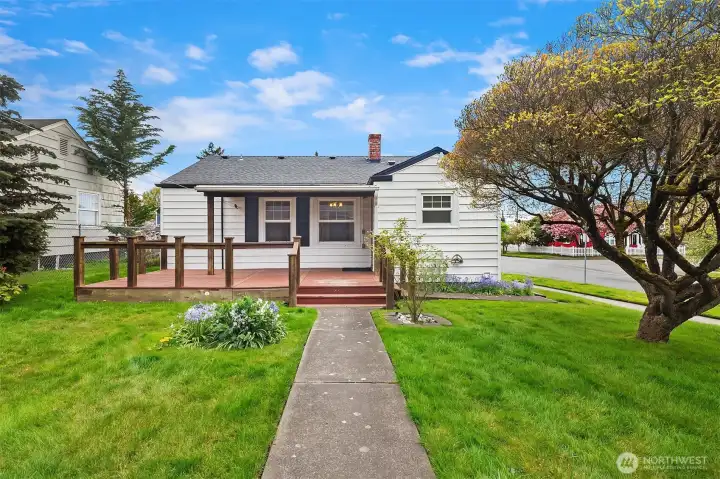 Paved walkway leading to back patio.