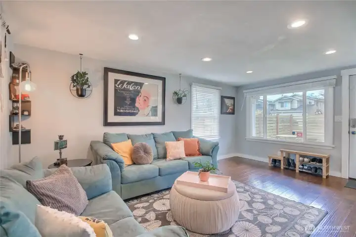 Bright, spacious main-level living room. Bright, spacious main-level living room.