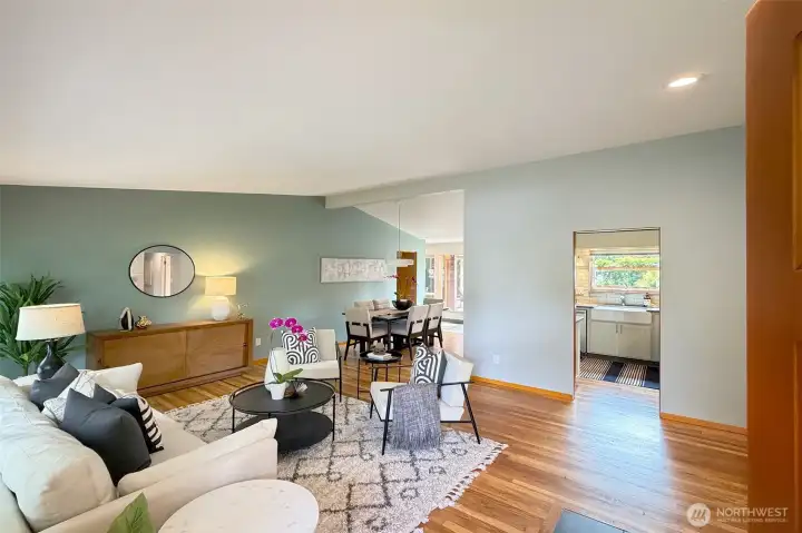Vaulted ceilings, freshly painted and open floor plan make this living space perfect for entertaining. Vaulted ceilings, freshly painted and open floor plan make this living space perfect for entertaining.
