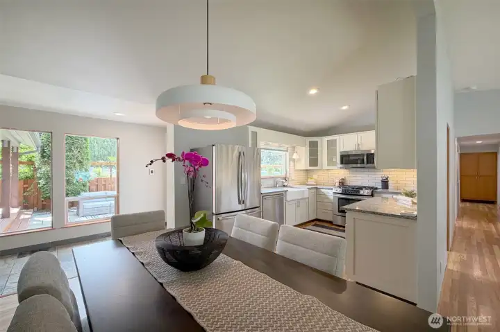 Open to large dining area and floor to ceiling windows surrounding your patio, deck and gardens. Open to large dining area and floor to ceiling windows surrounding your patio, deck and gardens.