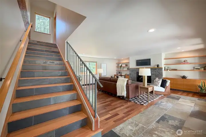 Heated stone floors for that extra warmth as you walk into this room or up the stairs to the first primary! Heated stone floors for that extra warmth as you walk into this room or up the stairs to the first primary!